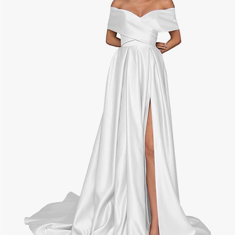 Never worn wedding dress. It’s satin and has a pull string corset.